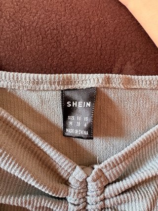 Top azul fruncido manga larga talla M