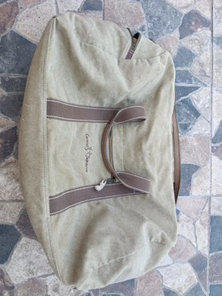 Mochila de lona beige y marrón