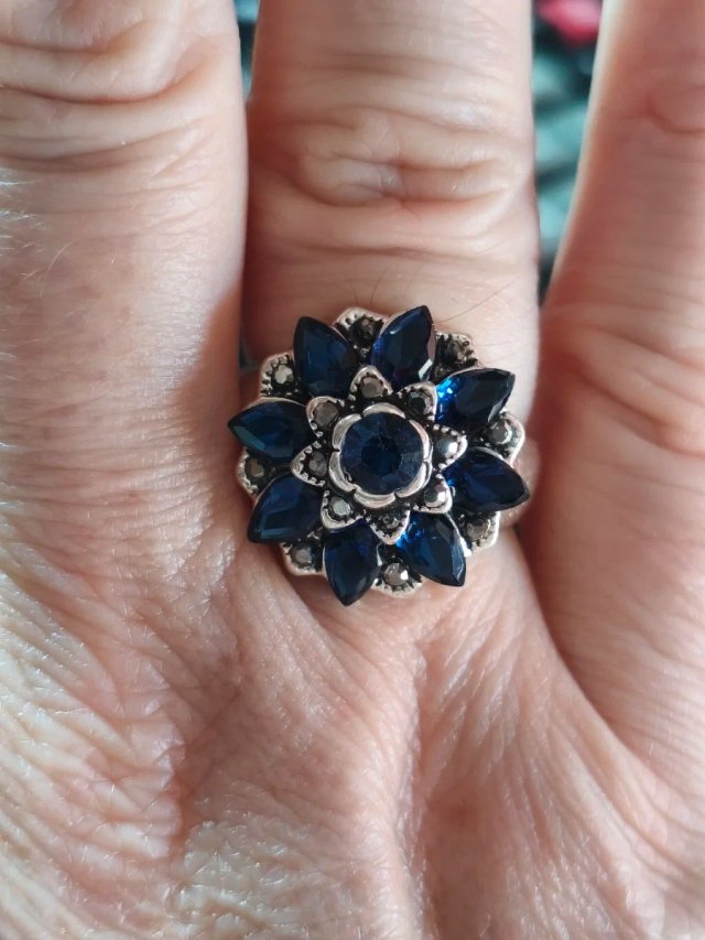 Anillo flor azul y plateado