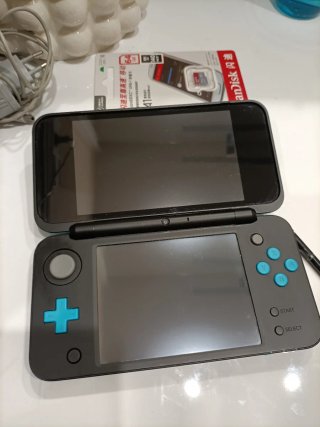 New Nintendo 2DS XL 64gb juegos Azul/negra