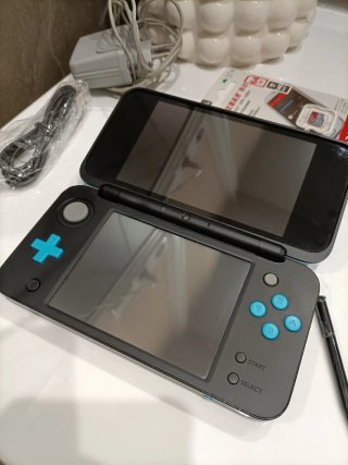 New Nintendo 2DS XL 64gb juegos Azul/negra