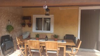 Mesa y 6 sillas de madera de teca