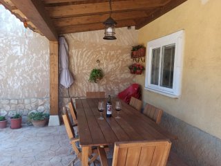 Mesa y 6 sillas de madera de teca