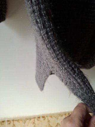 Maglione grigio collo alto