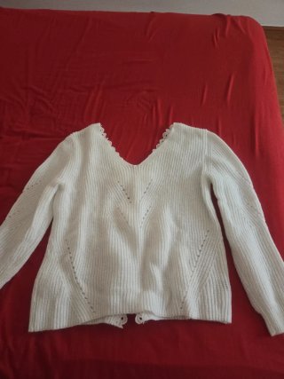 Jersey de lana blanco con lazos