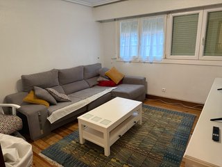 Sofá modular gris tela y madera