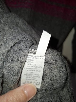 Maglione grigio e fucsia con pelliccia
