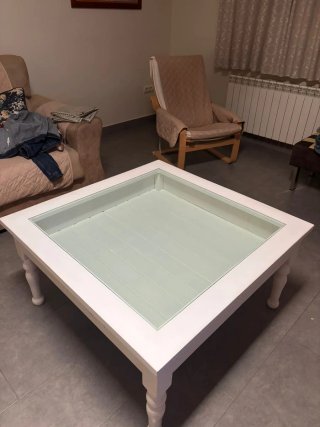 Mesa de centro con de cristal