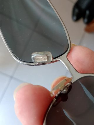 Occhiali da sole Miu Miu neri e argento
