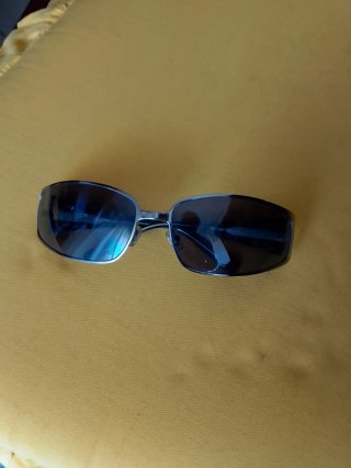 Occhiali da sole Miu Miu neri e argento