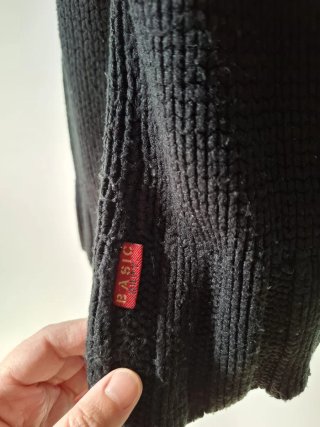 Maglione nero collo alto
