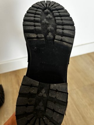 Botas altas negras con hebilla