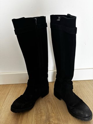 Botas altas negras con hebilla