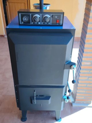 Caldera biomasa con depósito pellets