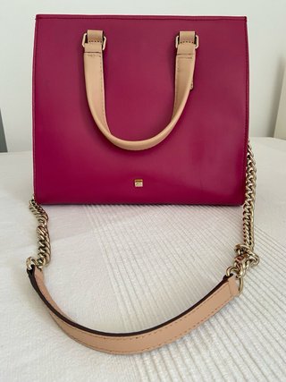 Bolso de piel rosa y dorado