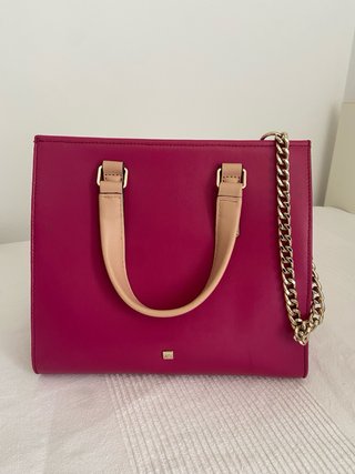Bolso de piel rosa y dorado