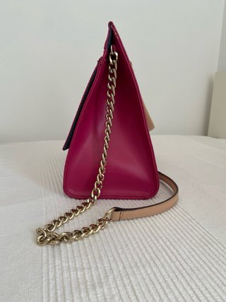 Bolso de piel rosa y dorado