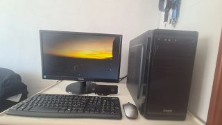 Basic office setup with Philips monitor, keyboard,