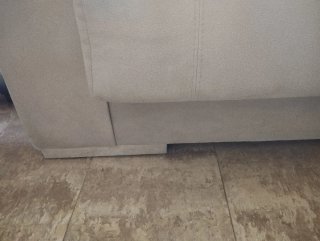 Sofá biplaza beige de tela