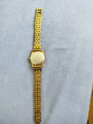 Reloj RELOX dorado y plateado