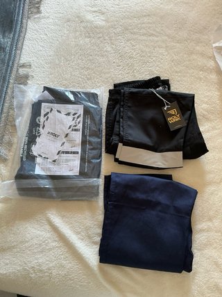 Pantalón de trabajo negro con reflectantes