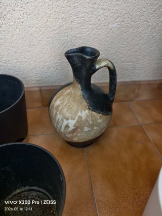 Juego de 7 macetas y jarra
