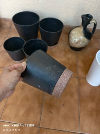 Juego de 7 macetas y jarra