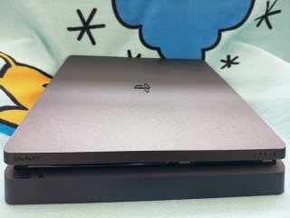 PS4 (PlayStation 4) con 2 mandos y juegos