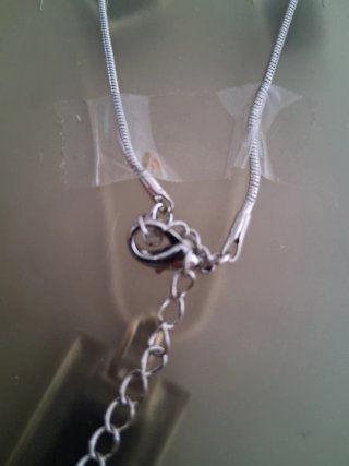 Conjunto plateado con circonitas