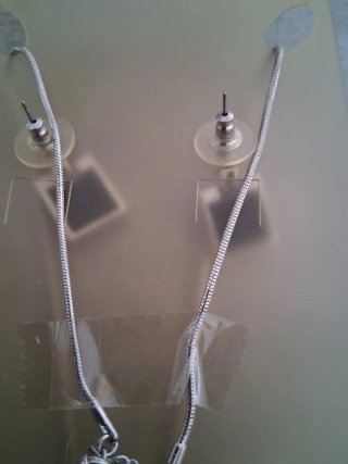 Conjunto plateado con circonitas