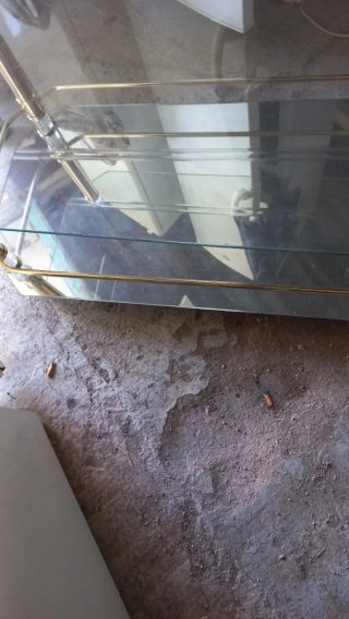 Mesa de centro cristal y metal dorado