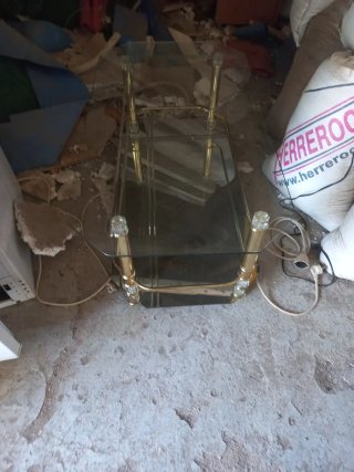 Mesa de centro cristal y metal dorado