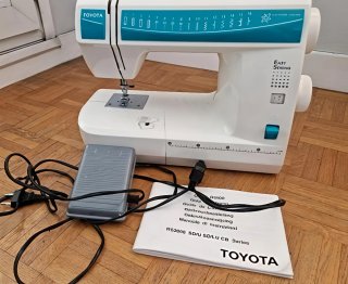 Máquina de coser Toyota Cambio por Notebook