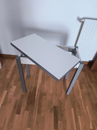 Mesa de cocina extensible gris y blanca