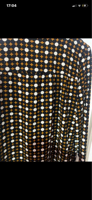 Camicia con fiocco e fantasia geometrica