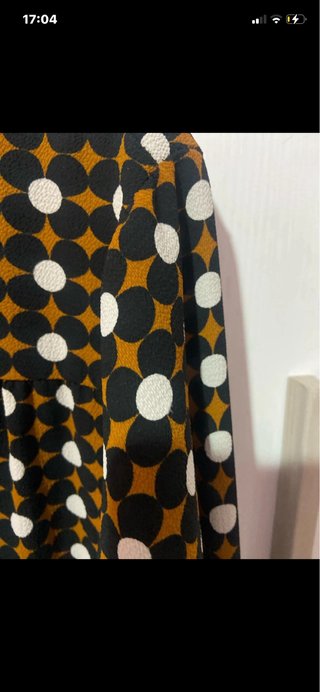 Camicia con fiocco e fantasia geometrica