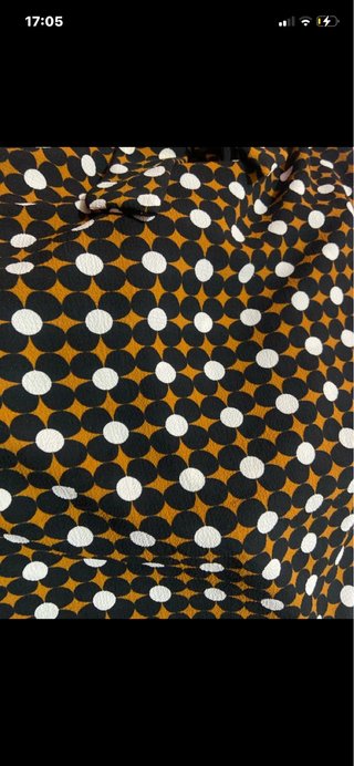 Camicia con fiocco e fantasia geometrica