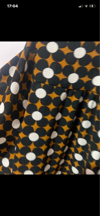 Camicia con fiocco e fantasia geometrica
