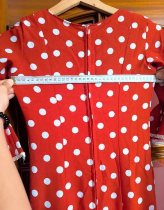 Traje de flamenca rojo con lunares blancos