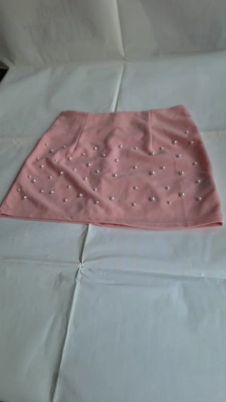 Gonna rosa con perle