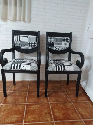Silla con reposabrazos .