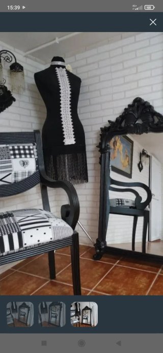 Silla con reposabrazos .