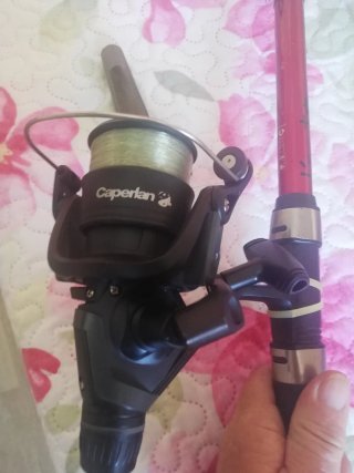 Caña de pescar con carrete nueva