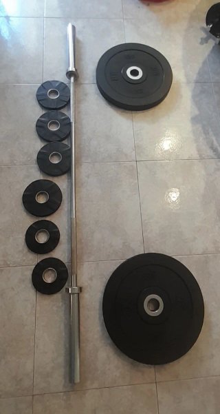 Barra olímpica con discos engomados