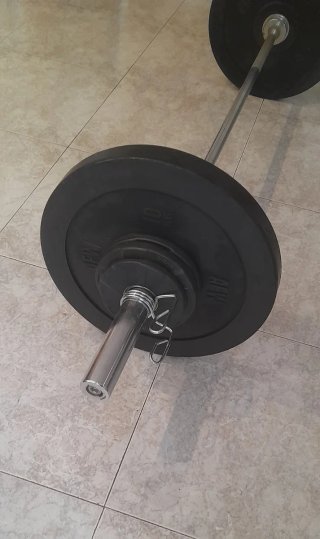 Barra olímpica con discos engomados
