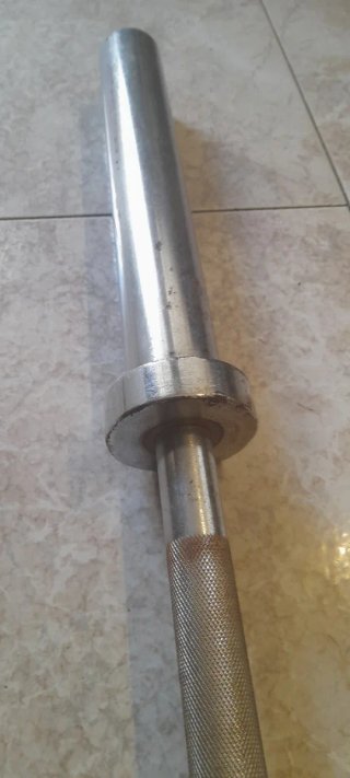 Barra olímpica con discos engomados