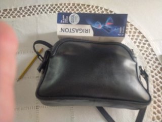 Bolso negro con cremalleras largas