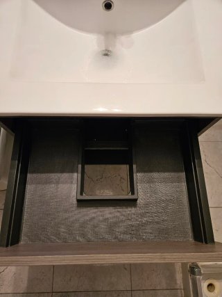 Mueble de baño con lavabo y cajones