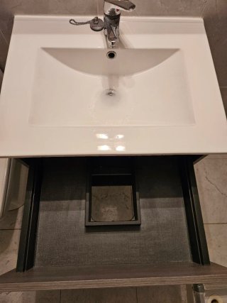 Mueble de baño con lavabo y cajones