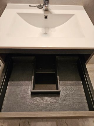 Mueble de baño con lavabo y cajones